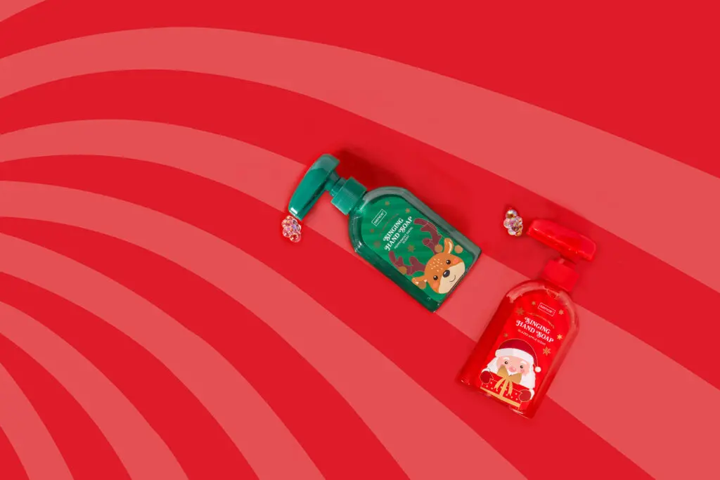 Sence Christmas Treats Singing Hand Soap on a festive red background