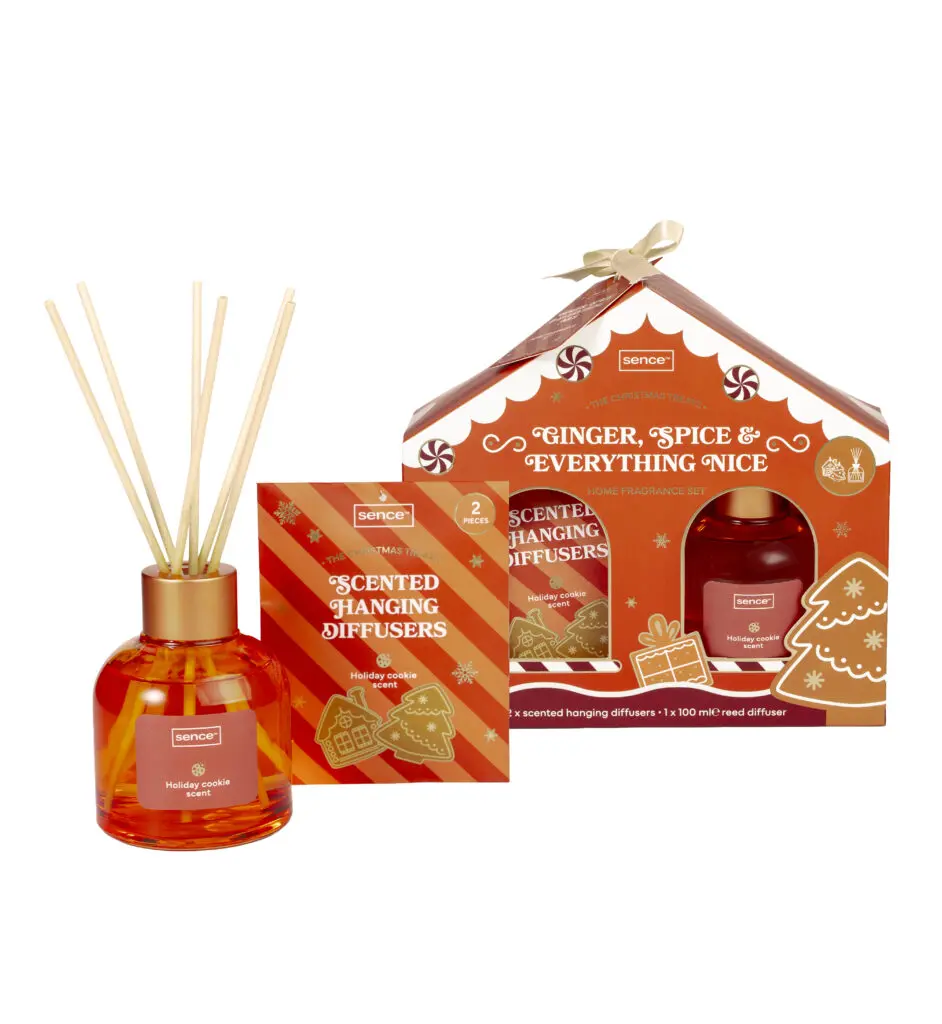 Sence Christmas Treats reed diffuser and fragrance card next to the gingerbread box