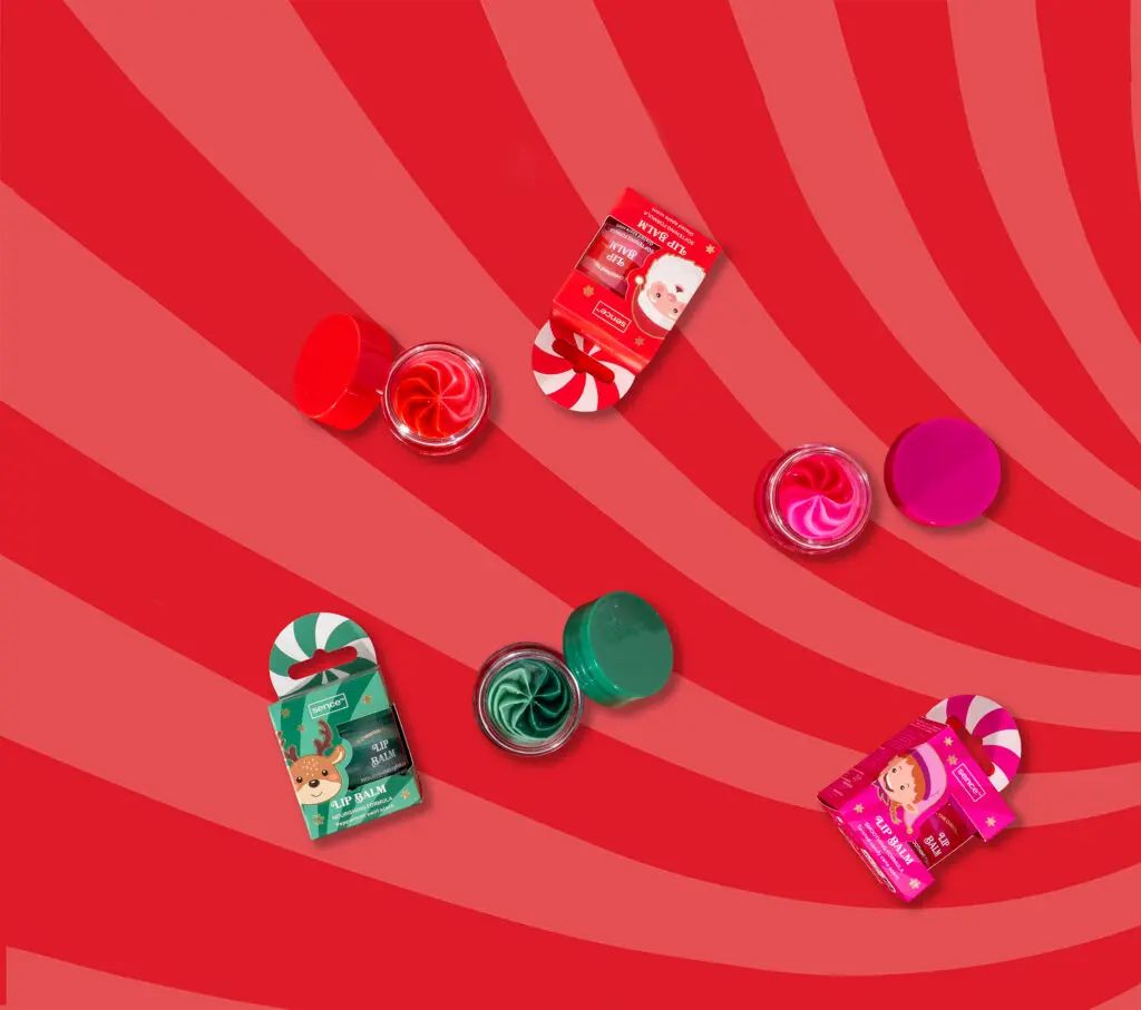 Sence Christmas Treats Cake Lip Butter jars on a red swirl background